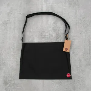 Stylish Kansū Black Musette Bag for Everyday Use.